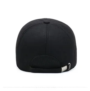 Rear view of black winter baseball cap showing silver metal buckle and elastic strap texture