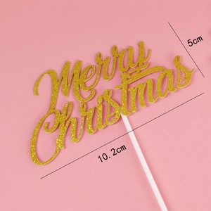 Décoration de gâteau dorée pailletée Joyeux Noël de dimensions 10,2 cm par 5 cm