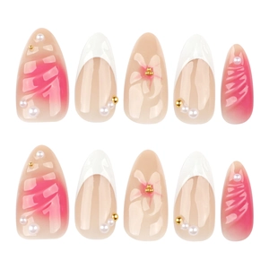 3D floral press-on nails with pink blush gradient and pearl accents on almond shape