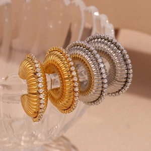 Chunky ribbed hoop earrings in gold and silver plating with cubic zirconia inlay detail