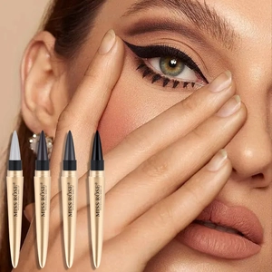 Detail of four colorful waterproof eyeliner pens next to a makeup model for visual effect