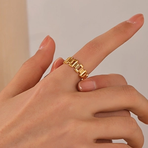 Minimalist gold plated stainless steel hollow geometric chain ring worn on finger