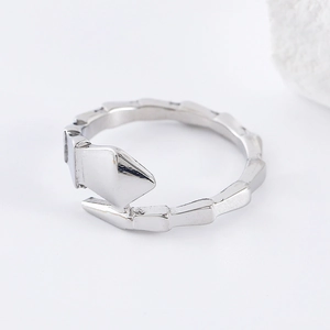 Minimalist silver vintage snake bone style ring with a polished metallic finish
