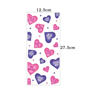 Detail view of 12.5x27.5cm Valentine cellophane bag with pink heart patterns