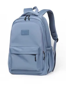 Detail of ergonomic breathable mesh padding on light blue school backpack straps