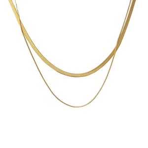 Double-layered gold snake chain necklace featuring a minimalist flat and fine metal design