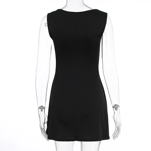 Detail view of the seamless back stitching on a slim fit black summer mini dress