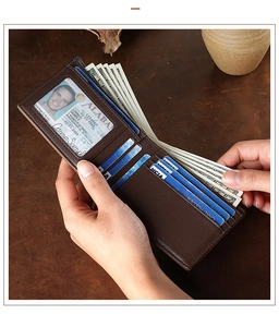 Detailed view of dark brown genuine leather wallet with multiple card slots and RFID protection