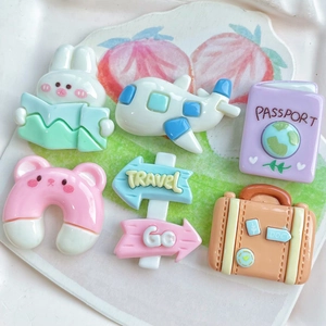 6-piece travel resin accessory set with airplane passport suitcase and road signs