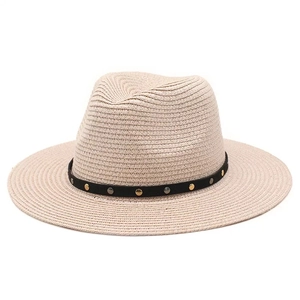 Beige wide brim woven straw hat featuring a black band with silver and gold studs