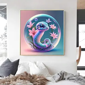 Detail of square gold framed snake diamond painting set in a modern living room