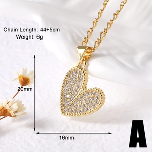 Detail view of gold-plated heart pendant with sparkling white cubic zirconia pavé setting