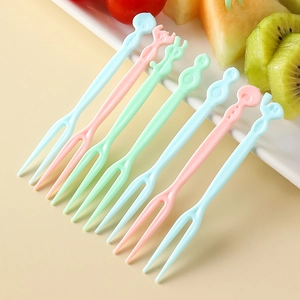 Colorful disposable plastic fruit forks set for home desserts and snacks serving