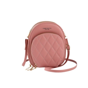 Pink quilted crossbody bag with gold chain strap and stylish diamond pattern stitching