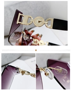 Macro shot of purple gradient lens, gold hinge, and textured circular temple detail