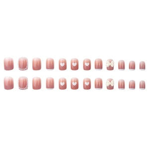 Pink gradient French press-on nails with white bows, pearls, and heart details
