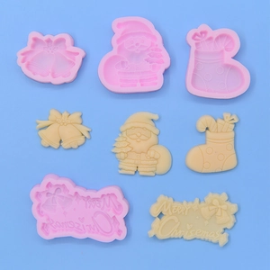 Christmas silicone mold set featuring Santa, socks, bells and Merry Christmas sign