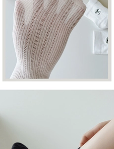 Detailed close-up of white breathable mesh texture and elastic knit on ballet socks