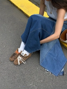 Brown suede distressed denim sneakers with frayed edges and dual-tone lacing design