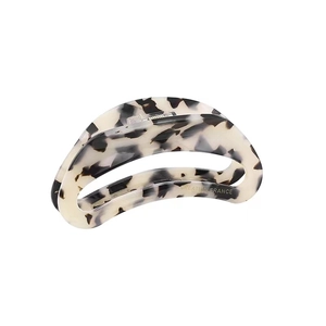 Oversized hollowed-out acetate hair claw clip with black and white marble pattern texture