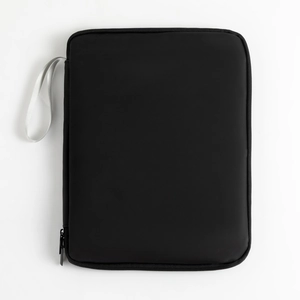 Close-up of sleek black waterproof PU laptop sleeve with durable grey nylon handle