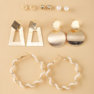 Detailed flat lay of silver alloy earring set with geometric shapes and faux pearls