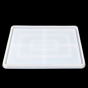 Detailed view of rectangular silicone mold with geometric layered design for DIY resin casting