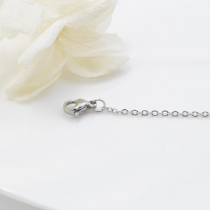 Polished silver titanium steel O-chain necklace with a classic lobster clasp closure
