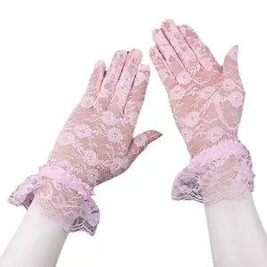 Elegant pale pink lace gloves with floral crochet patterns and ruffled wrist cuffs