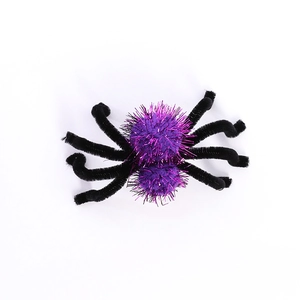 Halloween spider hair clip with purple plush balls and fuzzy black legs for party decor