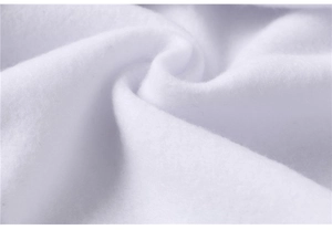 Close-up of soft white fleece fabric texture showing material thickness and warmth