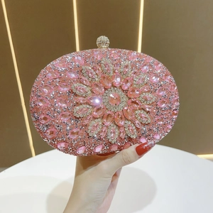 Close-up of pink sunflower rhinestone patterns on the luxury evening clutch bag