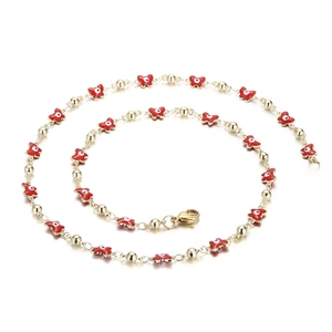 Gold evil eye necklace with red butterfly charms in a dynamic spiral layout