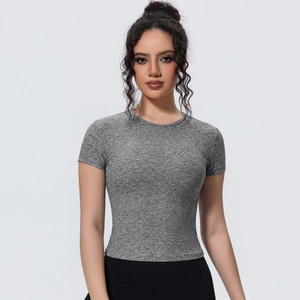 Close-up of heather grey yoga crop top showing breathable texture and slim fit design