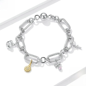 925 sterling silver bracelet with sunflower, bow, and cross charms on white background