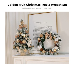 Detail of flocked Christmas tree and wreath with gold balls, pinecones and ribbons