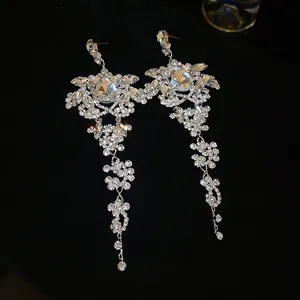 Elegant long silver tassel earrings with sparkling rhinestones for wedding and evening wear