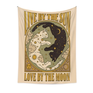 Celestial cat tapestry featuring sun and moon patterns with Live by the Sun text