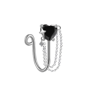 Detail of silver heart nose clip with black gemstone and delicate metal tassels