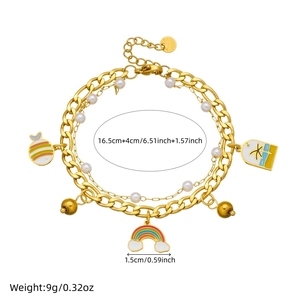 Gold plated layered bracelet with rainbow, cloud, and tropical fish enamel pendants