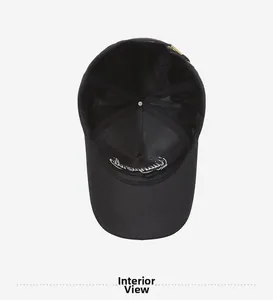 Interior view of black baseball cap showing stitch detail and metal adjustable buckle
