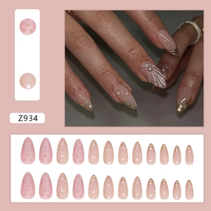 French almond press-on nails with 3D shell texture, pearls and gold metallic trim