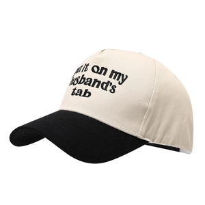 Two-tone trucker hat with Put it on my husband's tab embroidery in 45-degree view