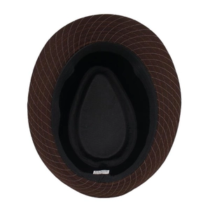 Detail view of dark brown fedora hat with diamond stitching and black inner lining