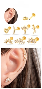 Detailed set of seven gold-plated stainless steel labret studs with zircon heart crown