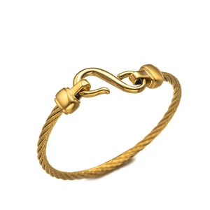 Minimalist gold-plated stainless steel cable bracelet with an S-shaped hook clasp