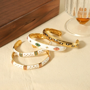 Retro 18K gold plated stainless steel open bangles with enamel and evil eye details