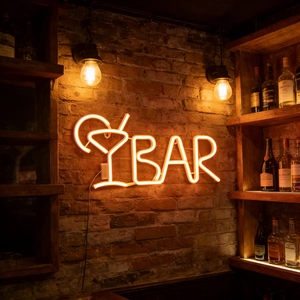Neon BAR sign with martini glass for wall decor on vintage brick background