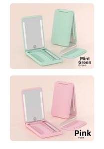Detail of portable LED makeup mirror set with integrated comb and tweezers in mint green