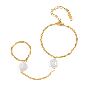 Elegant gold stainless steel ring bracelet featuring two natural baroque pearls for women